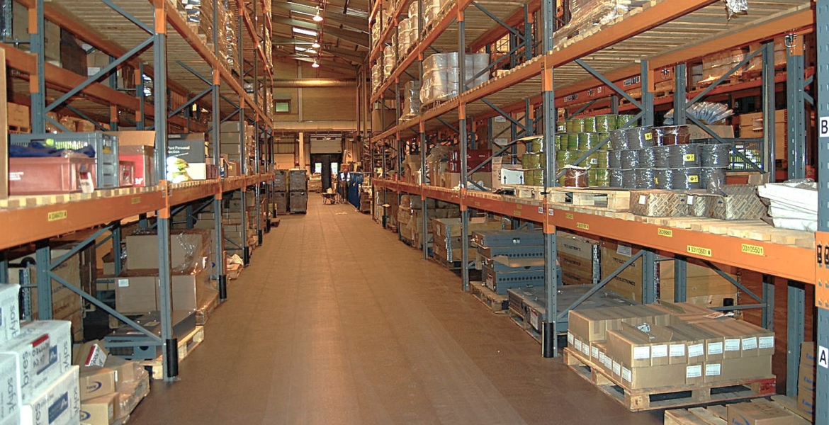 SSE Warehouse racking with ecotile interlocking floor tiles installed in the aisles