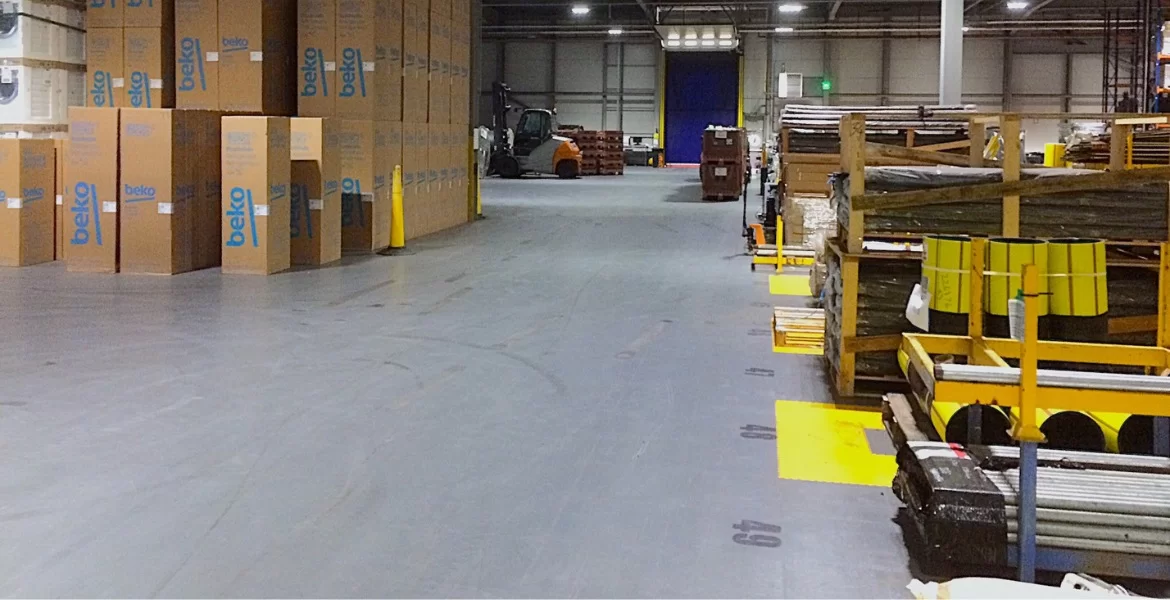 SSE warehouse with zones marked out using yellow Ecotile floor tiles