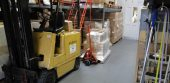 Cocap specialist packing services using Ecotile flooring in their warehouse