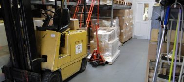 Cocap specialist packing services using Ecotile flooring in their warehouse