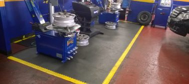 An Ecotile installed floor at Kwik Fit Cricklewood