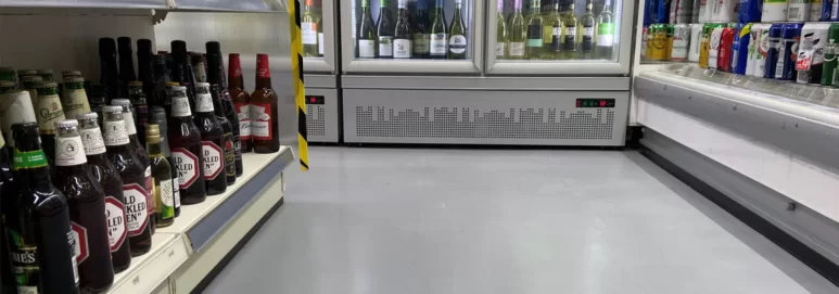 Low down shot of village store with Ecotile floor tiles used for commercial retail flooring