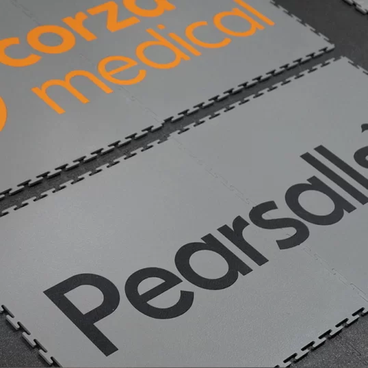 Corza Medical and Pearsals custom logos and floor graphic