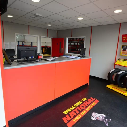 Custom branded welcome message at national tyres reception
