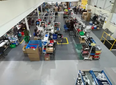 Old anti-fatigue mats replaced with seamless Ecotile modular flooring for a clean, unified finish.