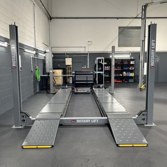 Commercial workshop with tools and equipment showing pvc flooring underneath