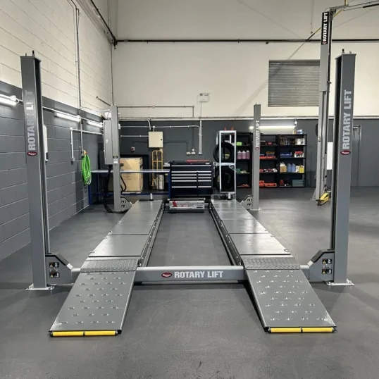 Commercial workshop with tools and equipment showing pvc flooring underneath