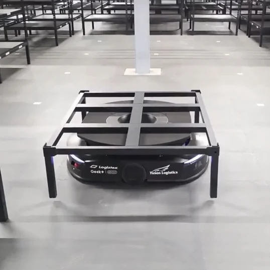 Image of a Geek+ robot shelf system and Ecotile floor with markers