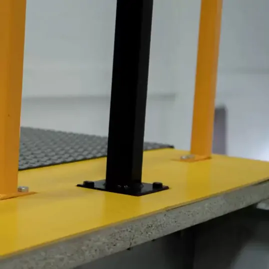 Close up image showing Ecotile tiles on top of a chipboard mezzanine floor